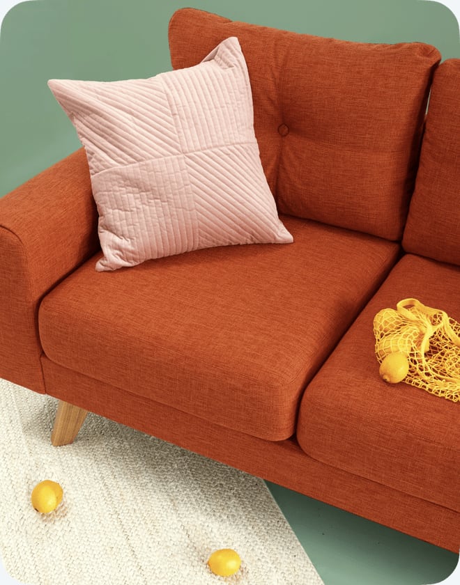 Oransje sofa som kan flyttes med Flytto